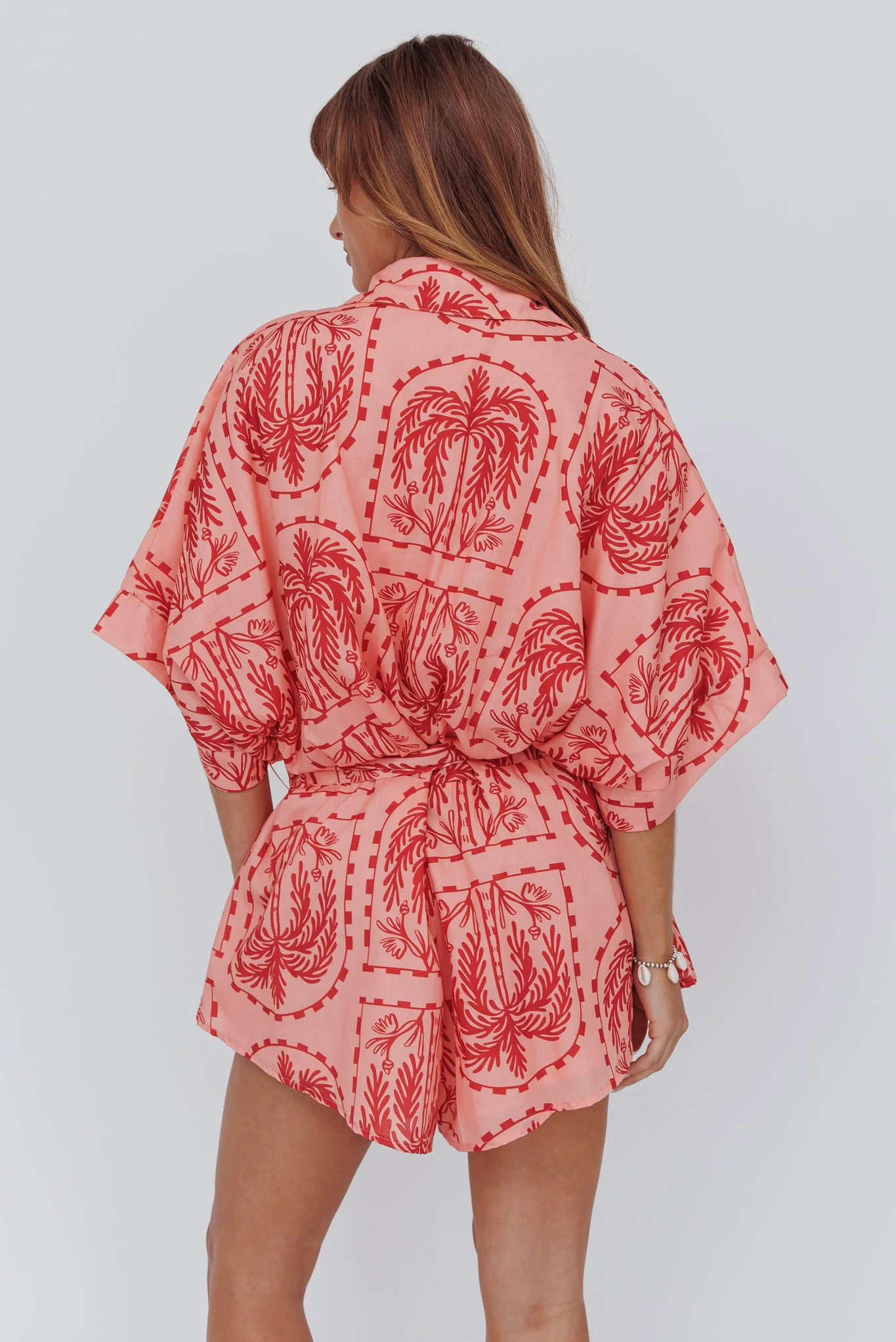 Daytona Beach Button-Up Romper Print Peach - Seraphlike